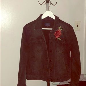 Jean jacket with flower patch. Super cute